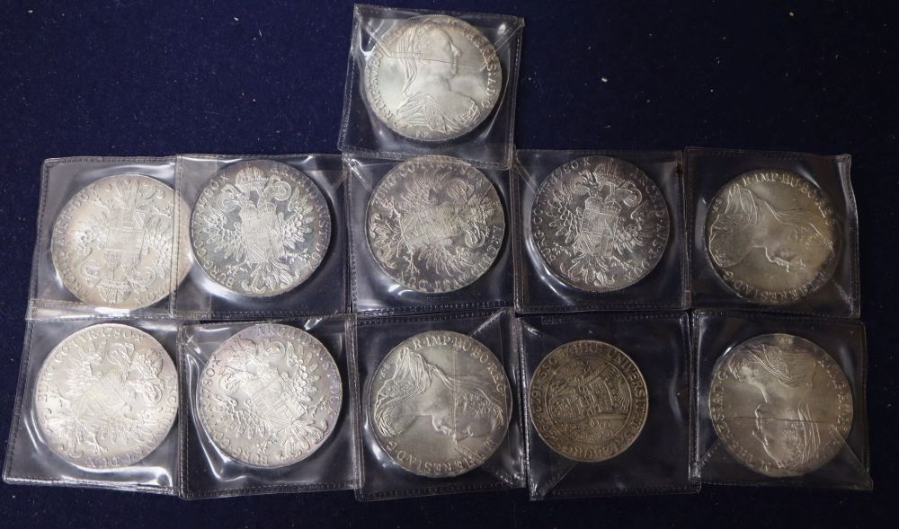 A group of Austrian silver Maria Theresa Thakers (UNC, 10) and a commemorative 50 schilling
